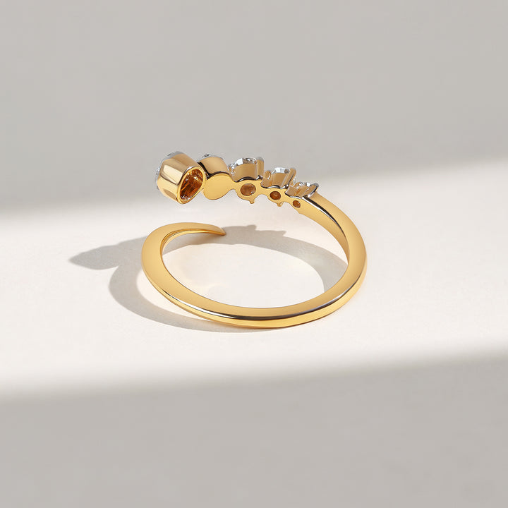 Back view of the Descend Dailywear Ring showing smooth gold band and open underside.