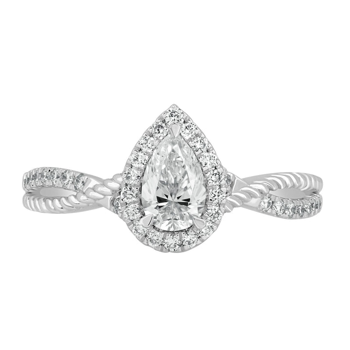 Front view of the 0.4 Ct Twist Shine Halo Solitaire Ring featuring a pear-shaped diamond framed by a halo of smaller diamonds on a twisted band.