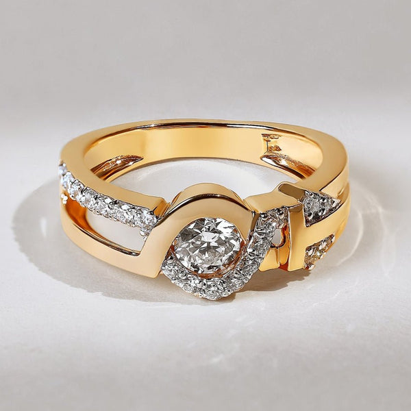 Gold ring with diamond accents on a light gray background