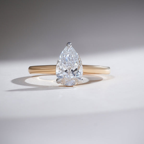 Hidden Halo 1.3 Ct Pear Solitaire Ring