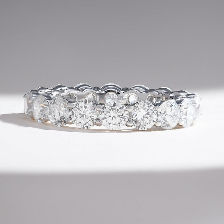 Front view of the 3.4 Ct Round Joint Eternity Band featuring a continuous row of brilliant round diamonds in a shared-prong setting.