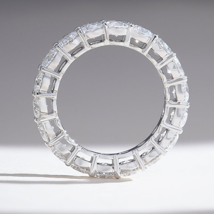 Profile angle of the 3.4 Ct Round Joint Eternity Band displaying uniform prongs and perfect diamond symmetry.