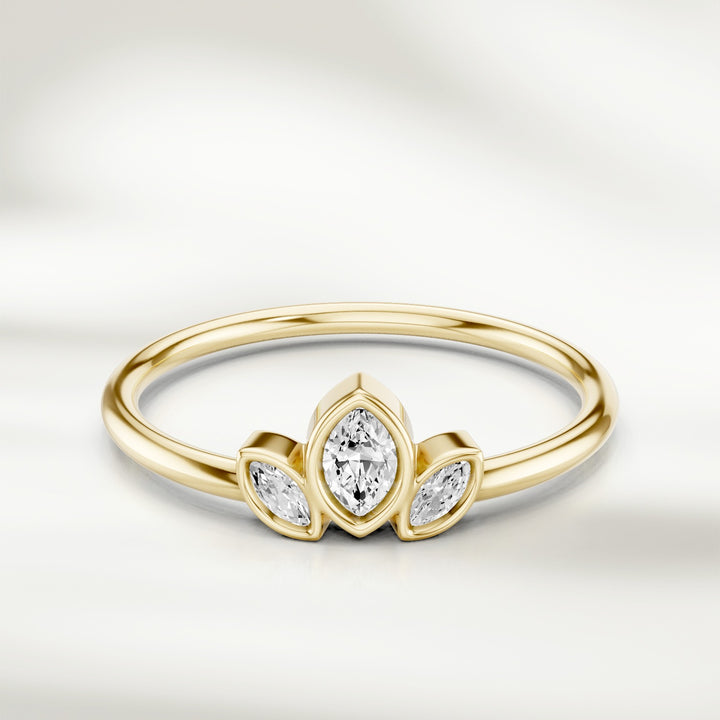 Three marquise diamond cluster ring in 9kt Champagne gold with slim polished band