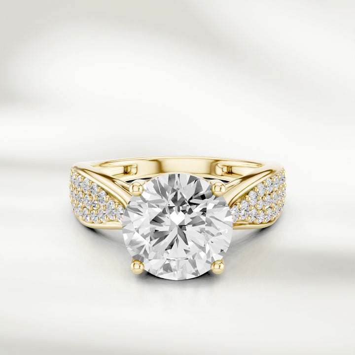 Infinite Love 2 Ct Round Solitaire Ring in champagne gold with diamond-studded split shank, front view.