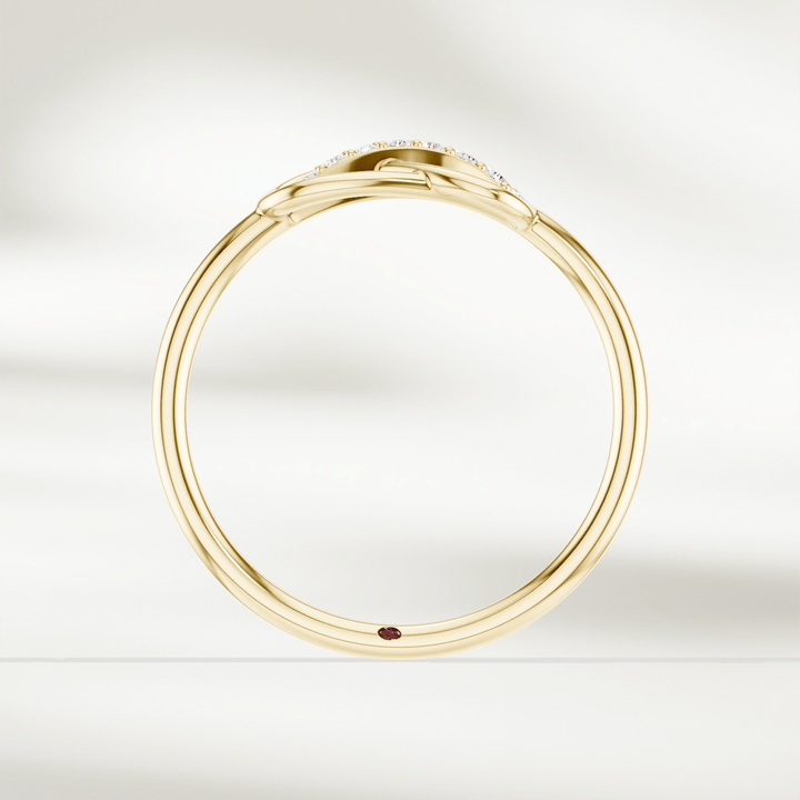 Gold infinity knot diamond ring with raised setting and slender band