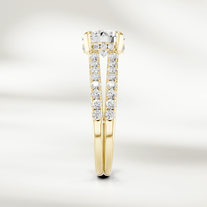Profile view of the Eira Solitaire Ring with intricate pavé detailing on the band and under-gallery.