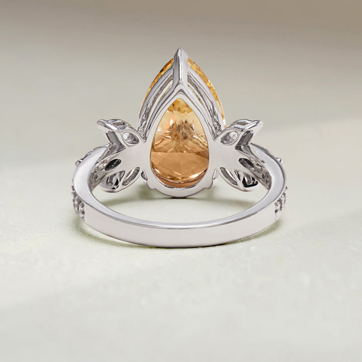 Back view of Golden Bloom Cocktail Ring showing open gallery and pear diamond setting.