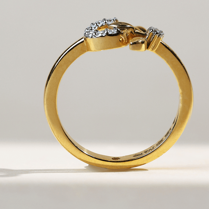 Profile shot of the Dandelion ring showcasing the diamond accents
