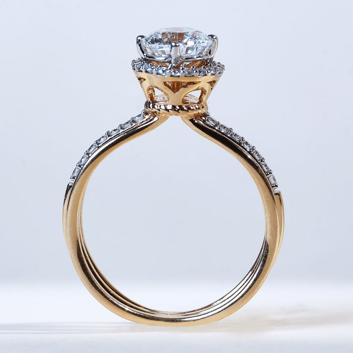 Profile shot of Orlo 1 Ct Solitaire Ring with raised round solitaire and halo design.