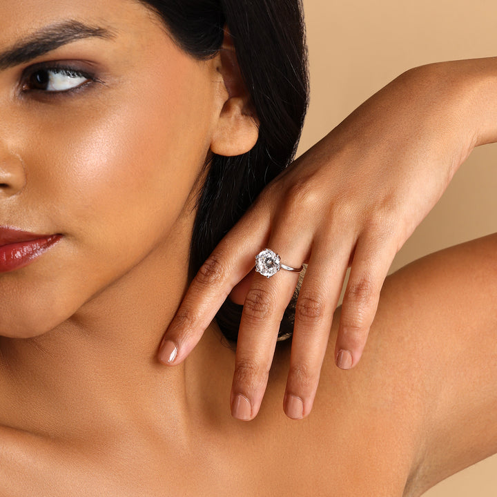 Model wearing 5.9 Ct Portuguese Hidden Gemstone Solitaire Ring, highlighting its size and luxury.