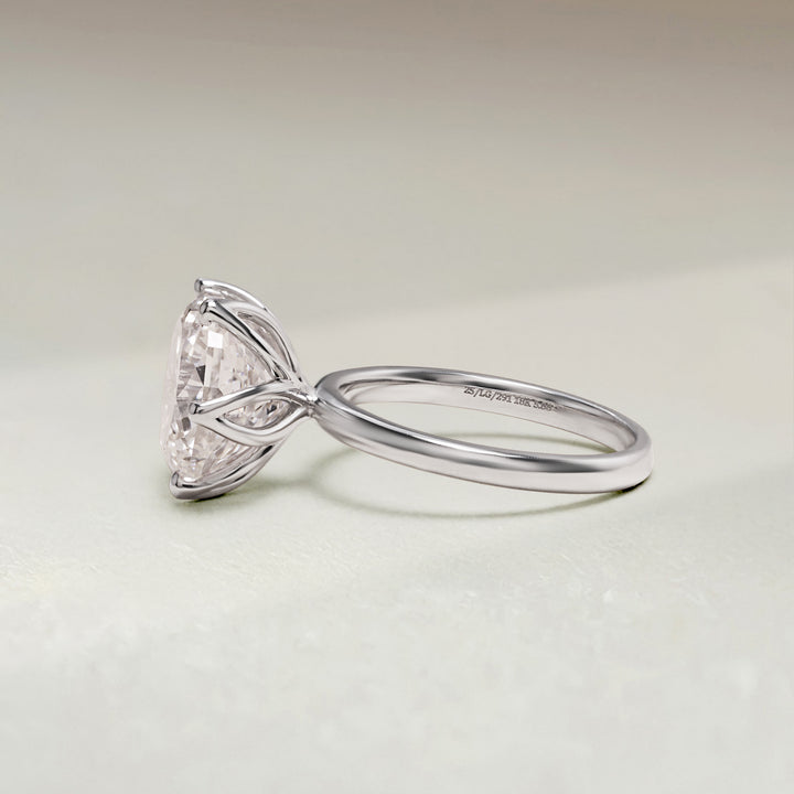 Side profile of 5.9 Ct Portuguese Hidden Gemstone Solitaire Ring with lotus-inspired basket design.