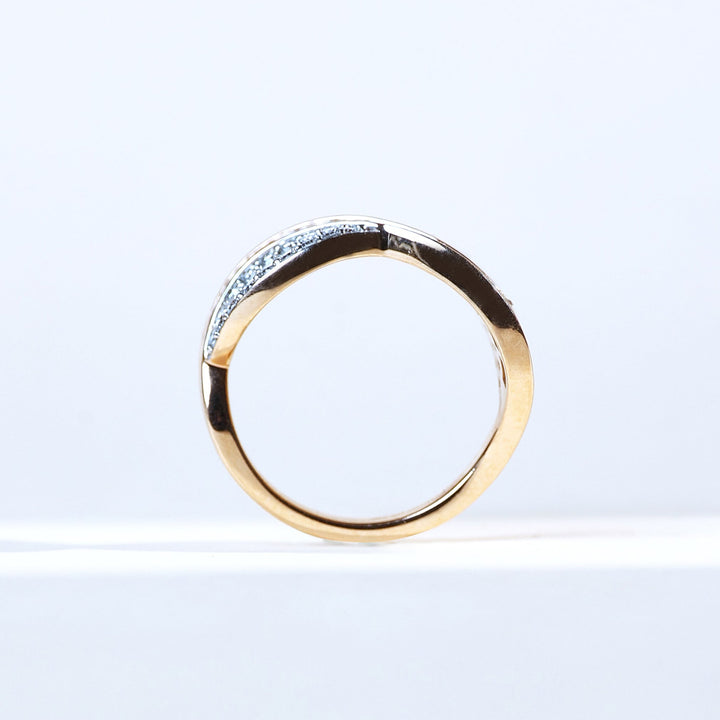 Profile view of Waveset 0.3 Ct Dainty Ring highlighting sleek wave silhouette