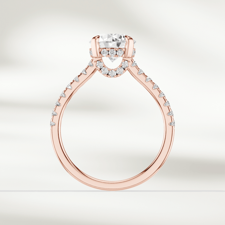 Profile view of the Eira Solitaire Ring with intricate pavé detailing on the band and under-gallery.