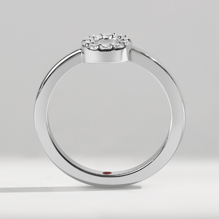 Side profile of 0.1 Ct Little Halo Ring showing sleek white gold band.