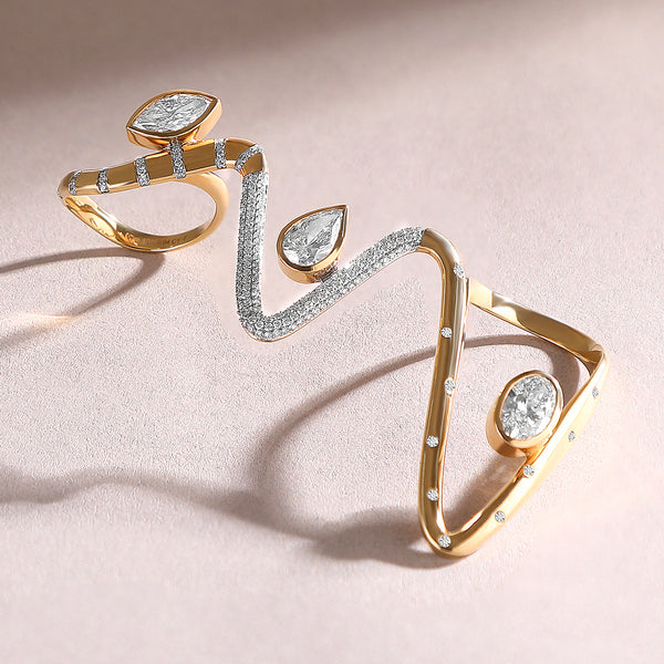 Front view of the Heartline 3.8 Ct Cuff Ring in yellow gold with marquise diamonds and pavé accents.
