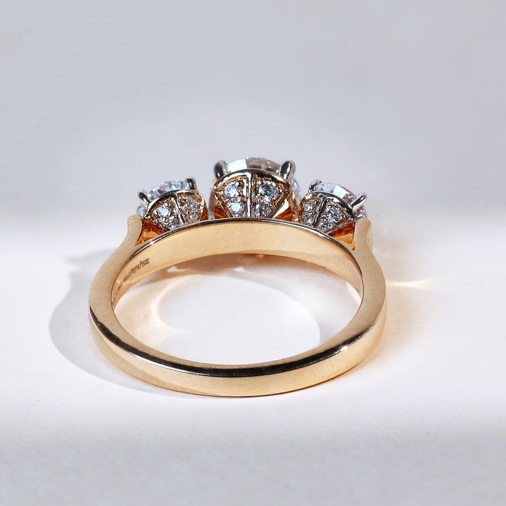 back view highlighting gold band and prong settings