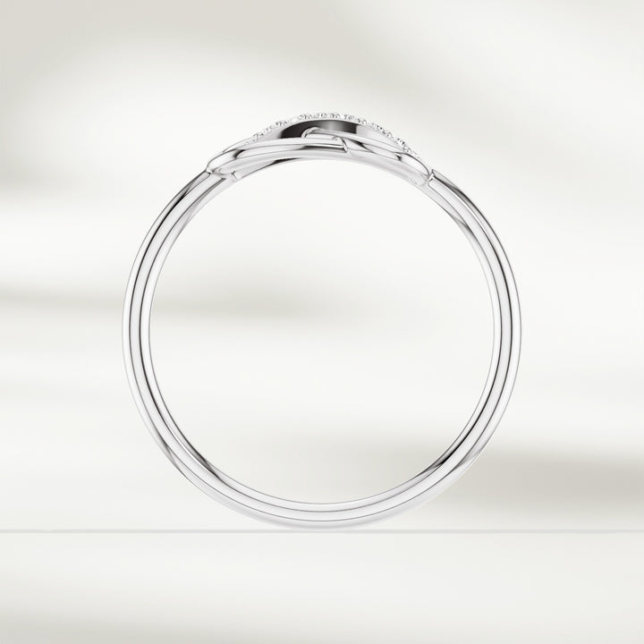 Gold infinity knot diamond ring with raised setting and slender band