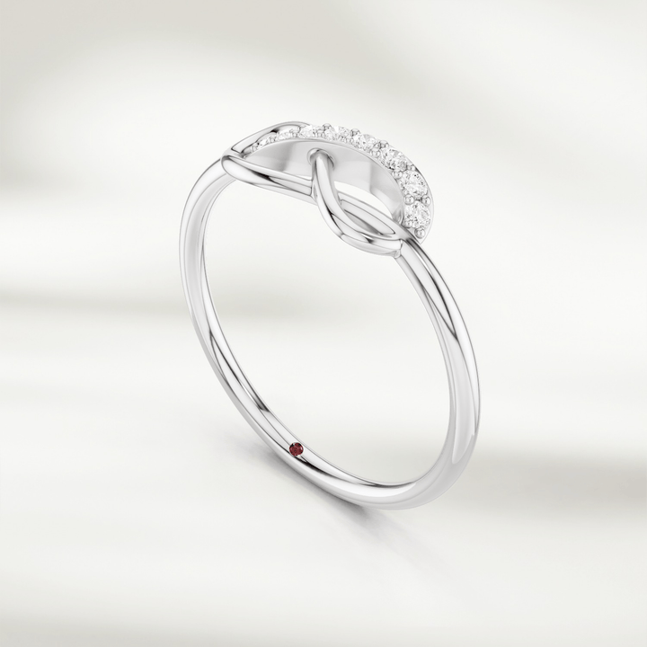 Gold infinity knot diamond ring with pavé-set accents and slim band