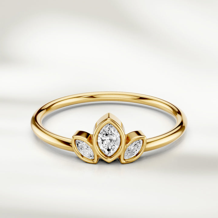 Three marquise diamond cluster ring in yellow gold with slim polished band