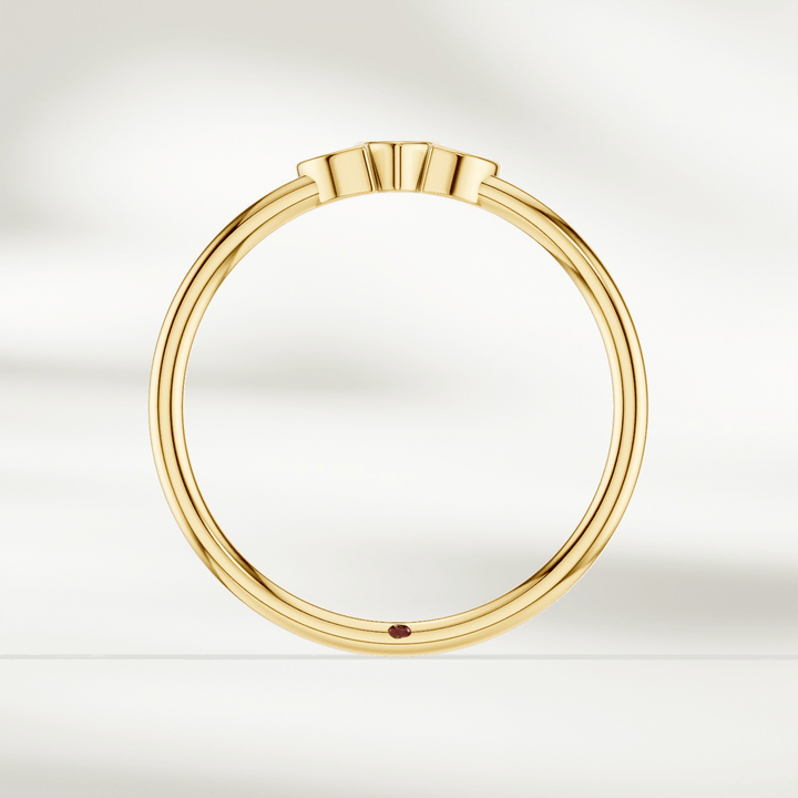 Side profile of 9 kt yellow gold marquise diamond cluster ring with slim polished band