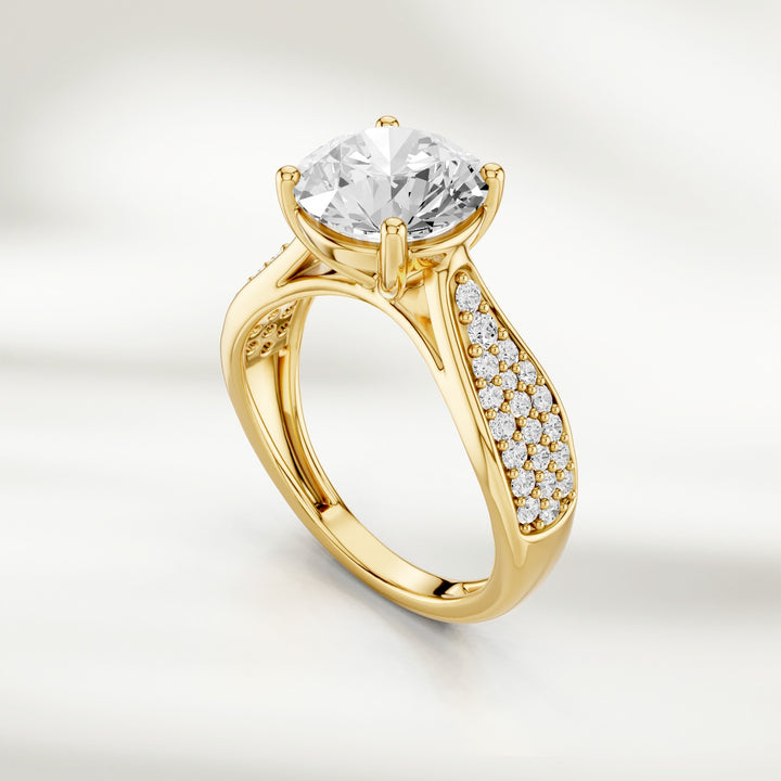 Angled view of the Infinite Love 2 Ct Round Solitaire Ring showing the pavé diamond detailing on the band