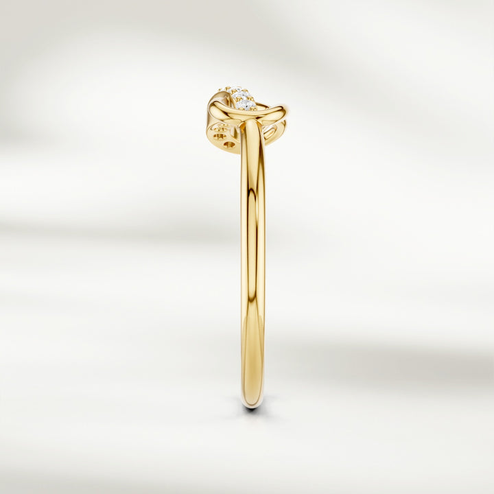 Gold infinity knot diamond ring with raised setting and slender band