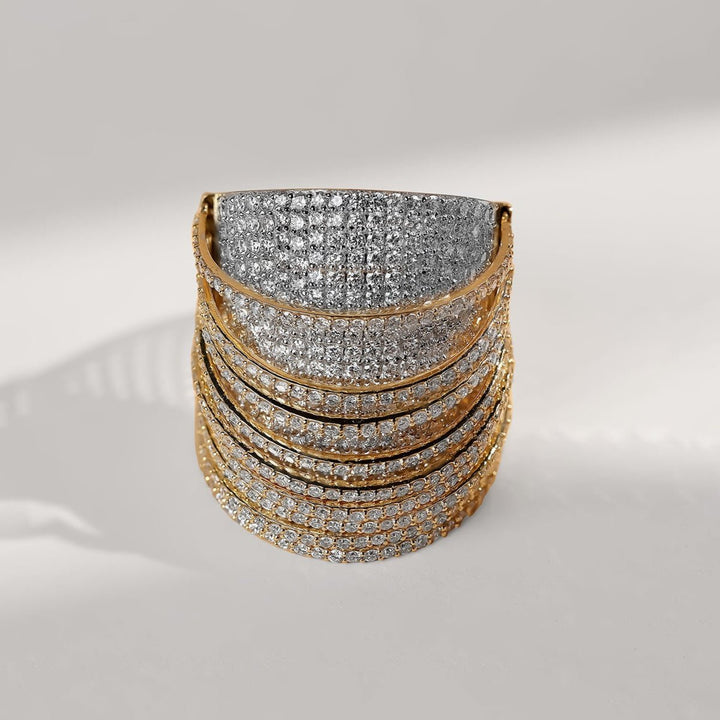 Front view of the Zinat Cocktail Ring featuring 4.7 carats of pavé-set diamonds in a bold, wide yellow gold band design.