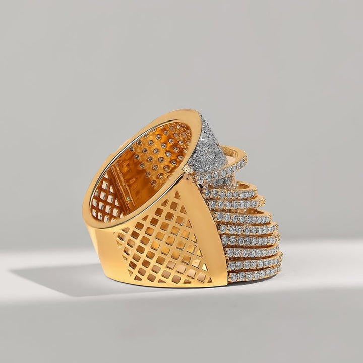 Side angle of the Zinat Cocktail Ring highlighting its diamond-studded cascading layers with an open latticework gold shank.