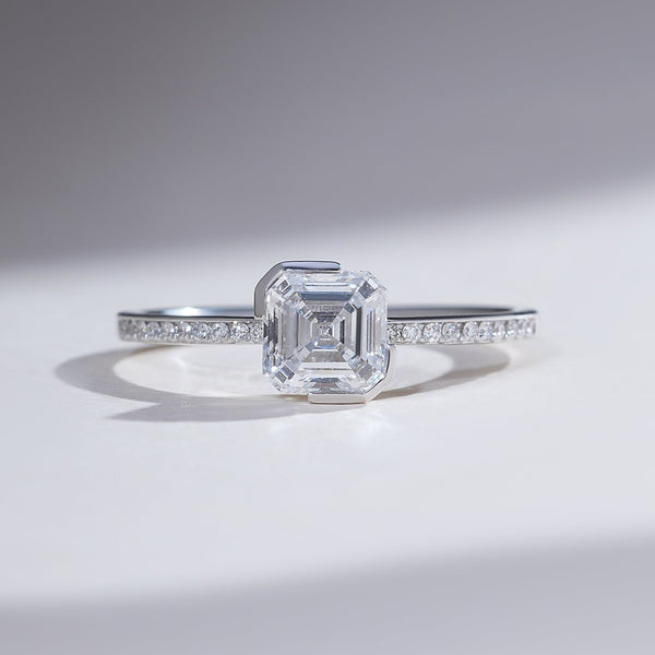 Front view of the 1 Ct Aria Asscher Solitaire Ring in platinum with a sleek pavé diamond band.