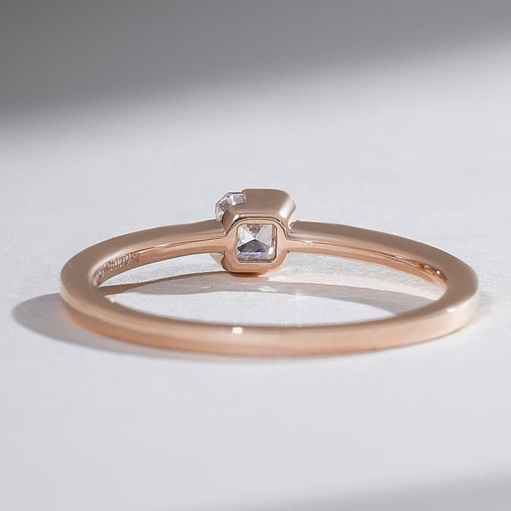 Back view of 0.3 Ct Aria Asscher Solitaire Ring showing diamond’s base and polished finish.