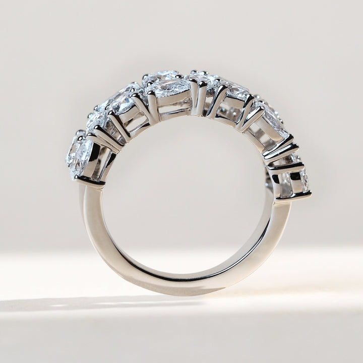 Side view of Azalea Half Eternity Band in white gold with diamond arcs.