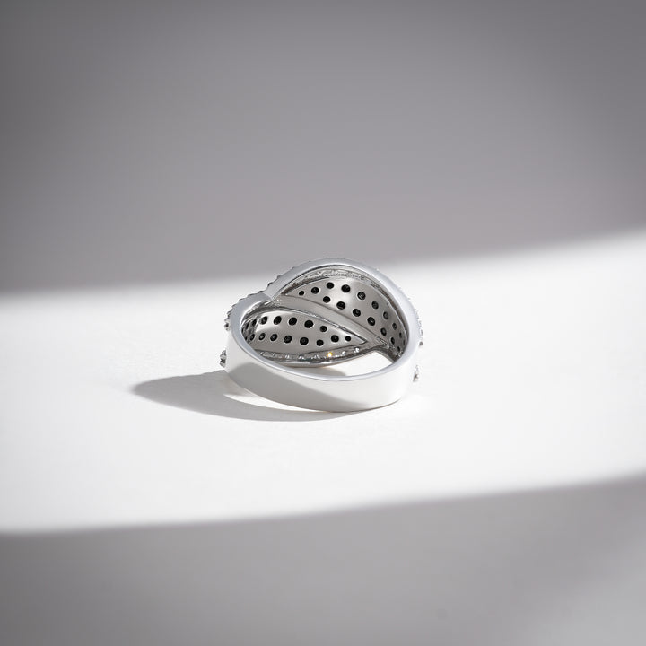 Back view of white gold diamond ring with open gallery and black stone settings for light flow.