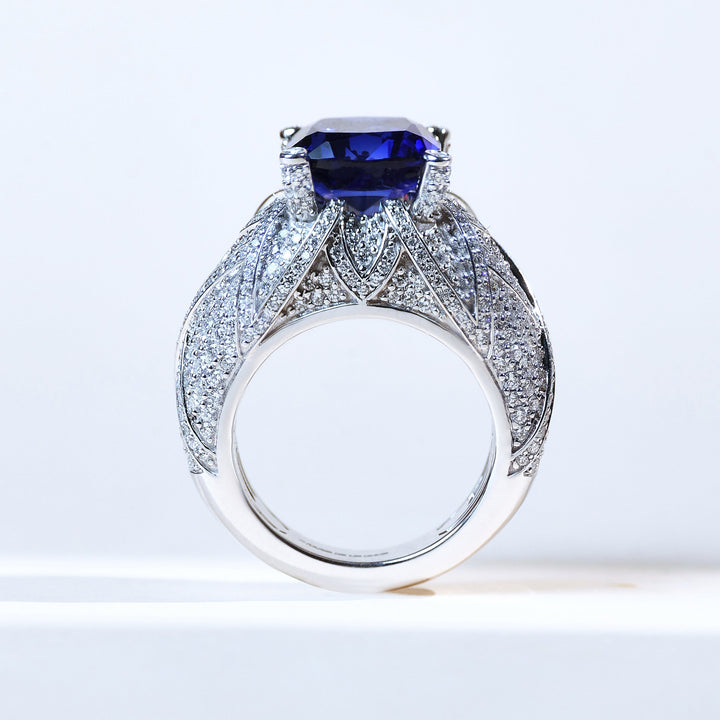 Side profile of Blue Empress 1.8 Ct sapphire ring with diamond detailing in white gold