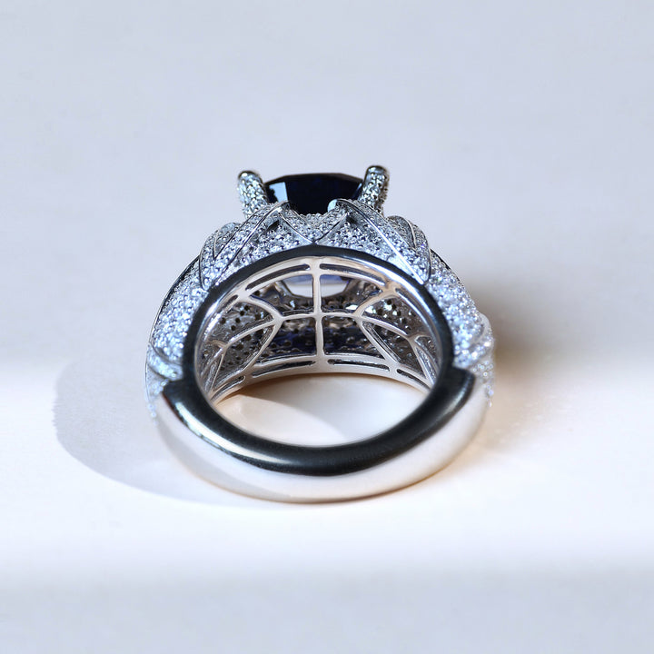 Back view of Blue Empress white gold ring with sapphire center stone and pavé diamond accents