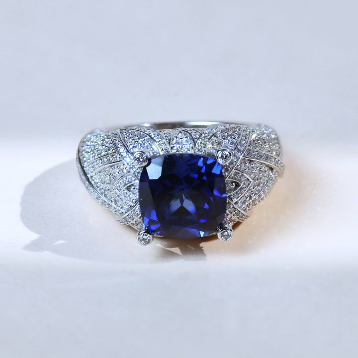 Front view of Blue Empress sapphire and pavé diamond ring in white gold