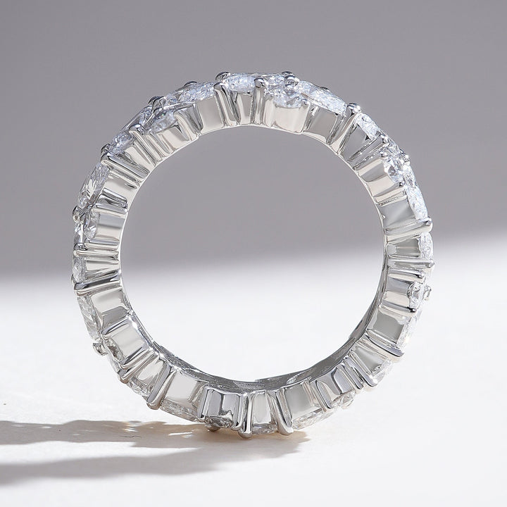 Profile view of the Celestial 3 Ct Pear & Round Eternity Band showing the uniform diamond arrangement around the band