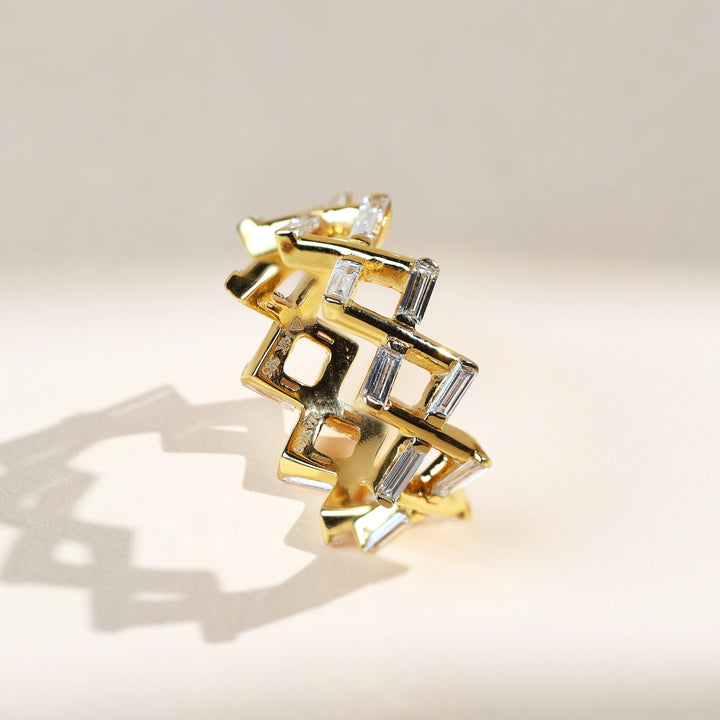 Front view of Criss Cross Tiara Daily Wear Ring in yellow gold with baguette diamonds.