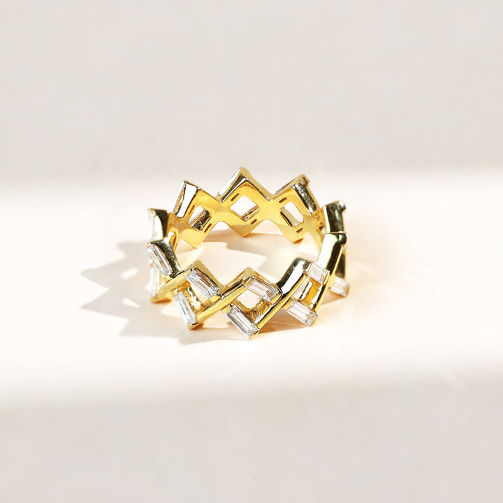 Side view highlighting baguette diamonds in a tiara-like design.