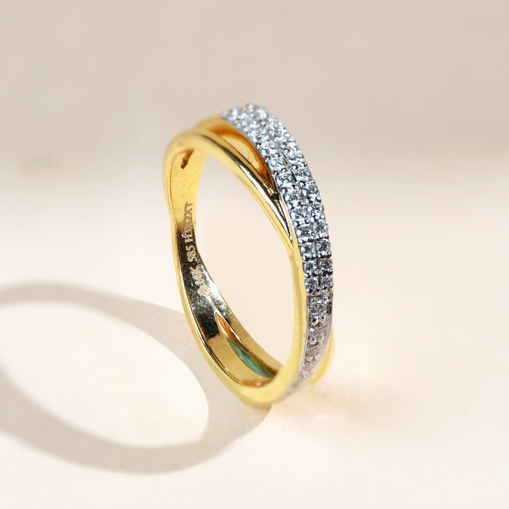 Side angle of Crossroads Dailywear Ring showcasing its curved gold band.