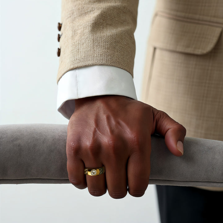 Lifestyle shot of Czar Titanium Ring worn by a man in beige suit.