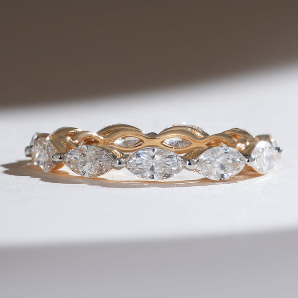 Front view of the East and West Marquise 2 Ct Eternity Band in yellow gold with marquise-cut diamonds in a classic east west setting.