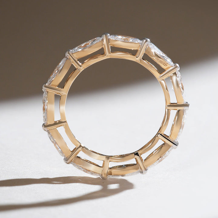 Side profile of the East and West Marquise 2 Ct Eternity Band showcasing detailed craftsmanship and open gallery design