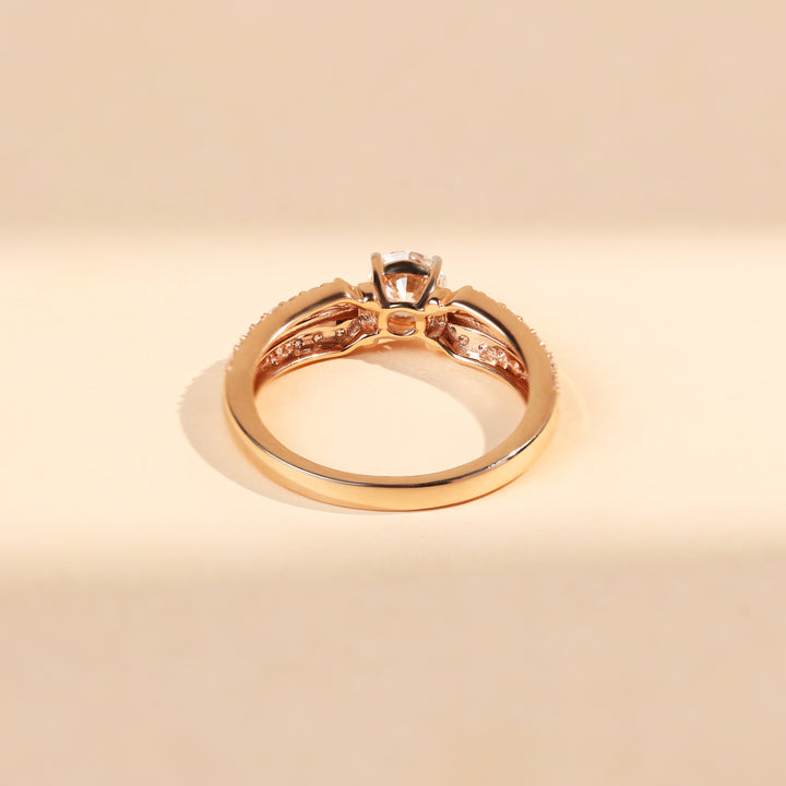 Back view of Elaris 0.5 Ct Solitaire Ring showing the prong setting and detailed pavé band in rose gold.
