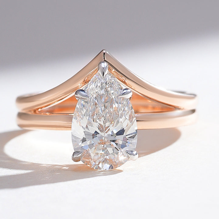 Front view of Elowen 1.8 Ct Pear Solitaire Ring in rose gold with split shank design.