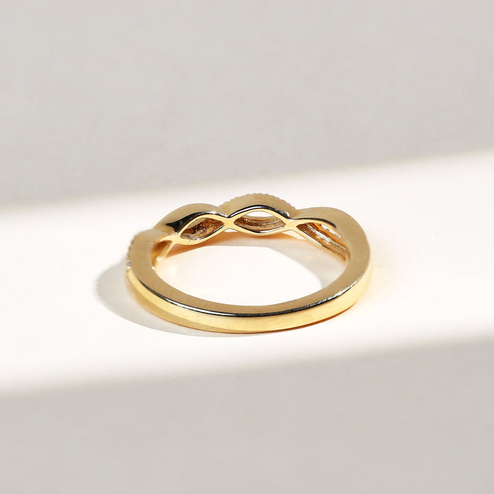 Back profile of Entwined Promise Ring showing smooth yellow gold band.
