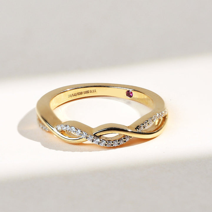 Entwined Promise Ring in yellow gold with two diamond-studded strands crossing gracefully