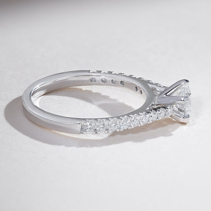 Top view of the Everlasting Love Round Solitaire Ring with a sleek pavé diamond shank leading to the central round-cut diamond.