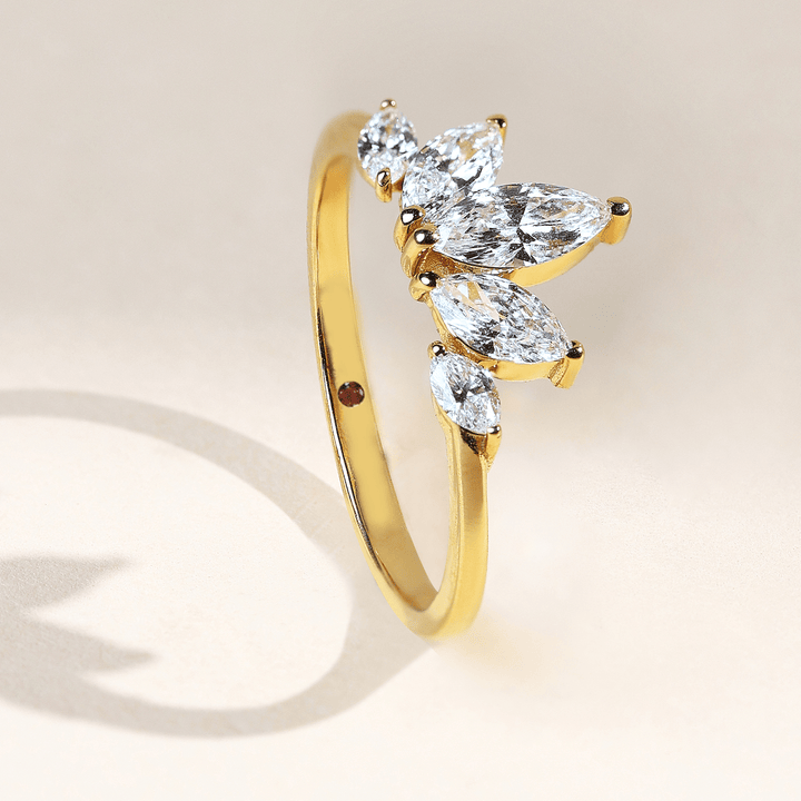 Angled side view of 0.7 Ct Five Petal Flora Ring showing marquise diamonds set in a petal-like cluster.