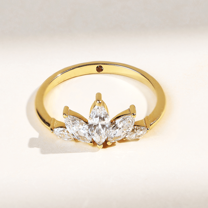 Front view of 0.7 Ct Five Petal Flora Ring in yellow gold with marquise-cut diamonds arranged in a floral crown design.