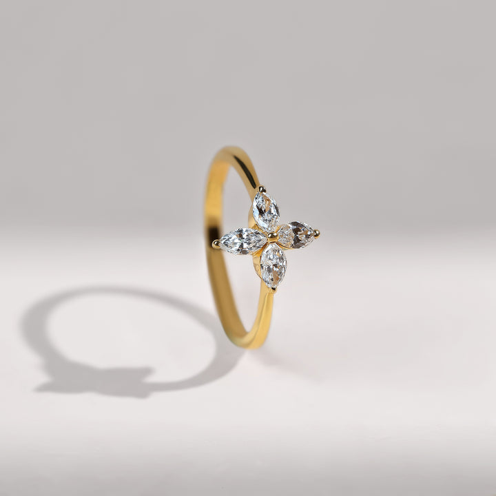 Side angle of the Fleur Promise Ring, showing the gold band and raised floral diamond cluster.